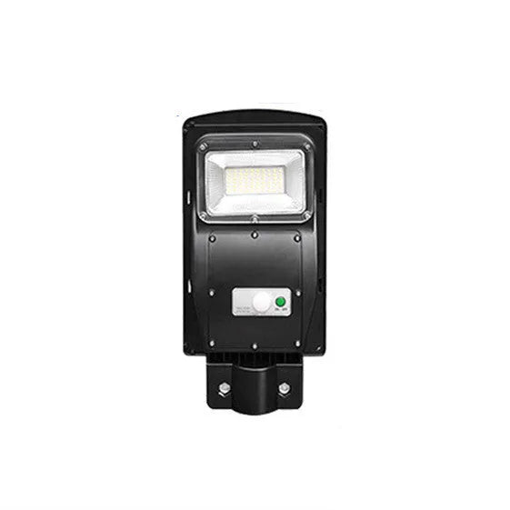 Integrated solar street light unit with solar panel and LED light in one housing