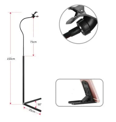 Black bedside mobile phone holder with universal clip and adjustable overhead support shelf mounted on bed frame