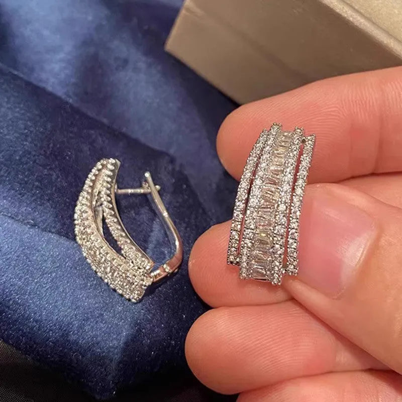 Geometric zircon stud earrings in white gold colour plating for women casual wear