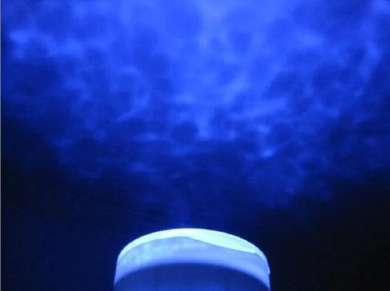 Blue ocean LED projection lamp showing DLP trapezoidal correction for children's puzzle environments