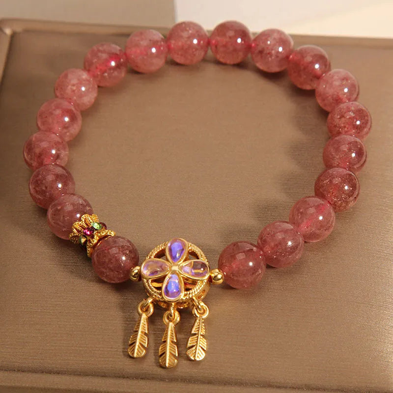 Women's strawberry quartz bracelet with four leaf clover dream catcher crystal pendant