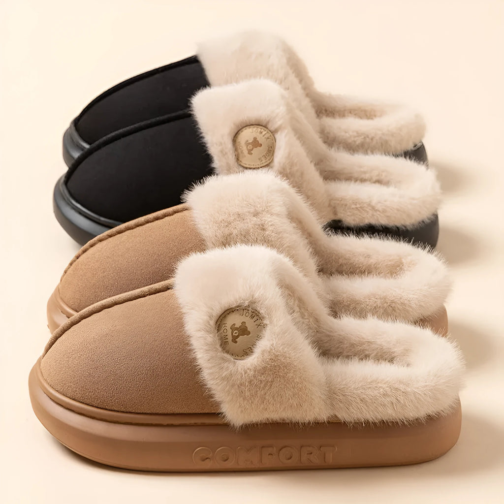 Fleece indoor slippers with thick PVC soles in various colours showing car stitching detail