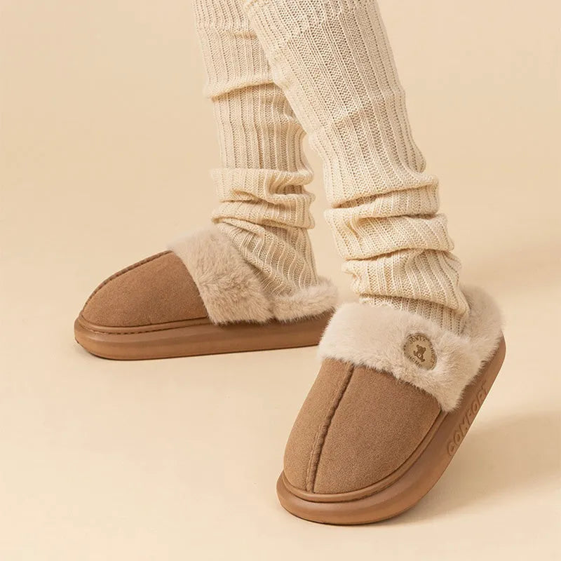 Fleece indoor slippers with thick PVC soles in various colours showing car stitching detail