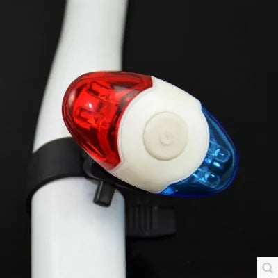 Red and blue LED bicycle tail light with adjustable mounting base shown in horizontal and vertical positions.