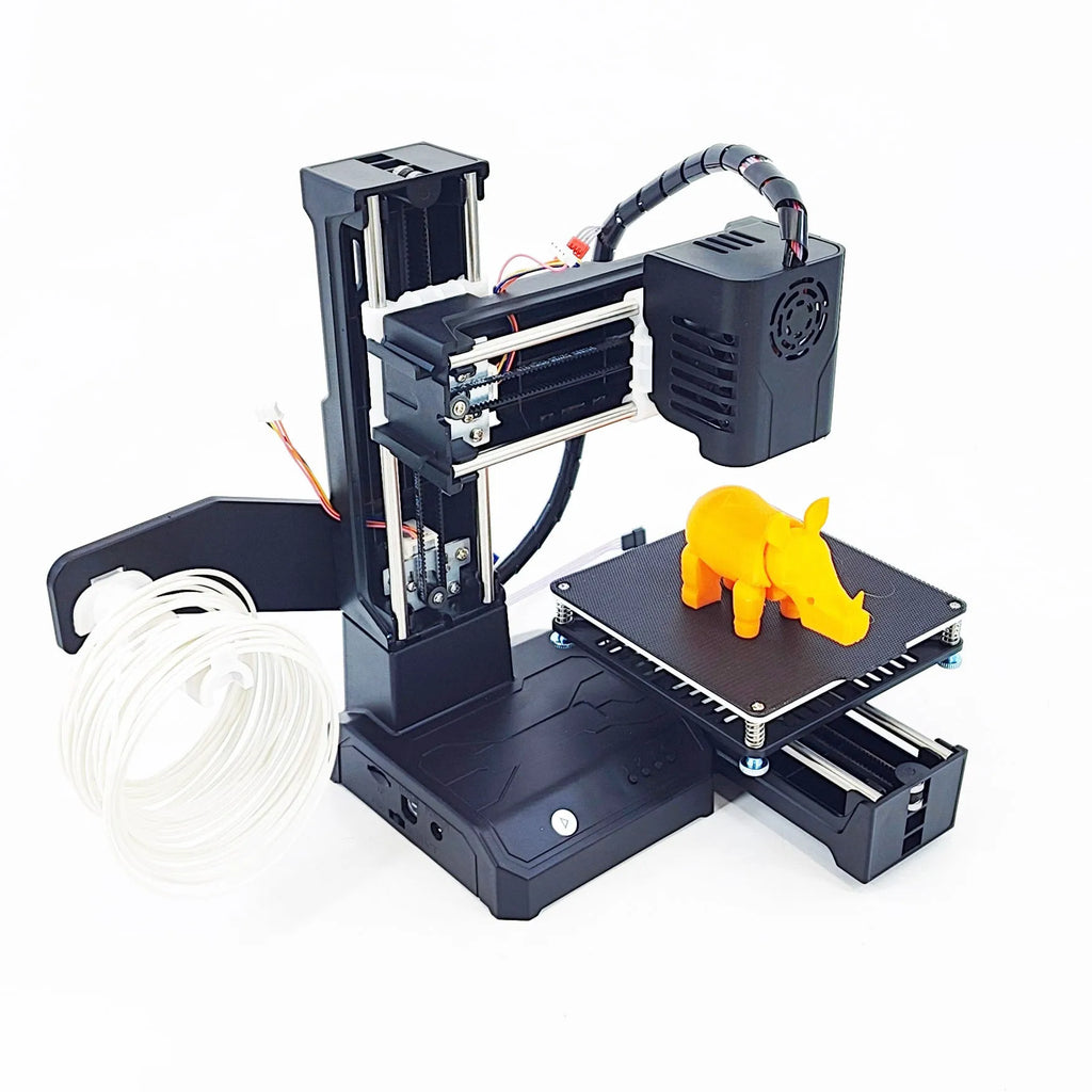 K9 New Mini desktop 3D printer in black or blue colour on a workspace.