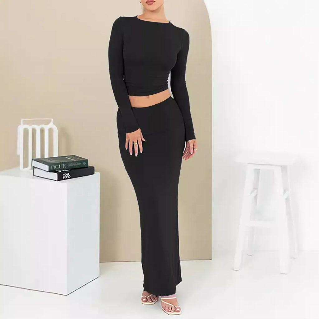 Women's sweet style two-piece suit set with long skirt and three-quarter sleeves in solid colour.