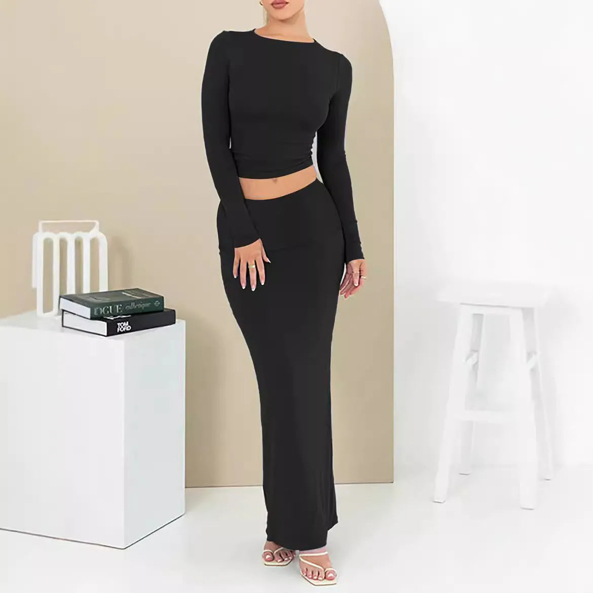 Women's sweet style two-piece suit set with long skirt and three-quarter sleeves in solid colour.