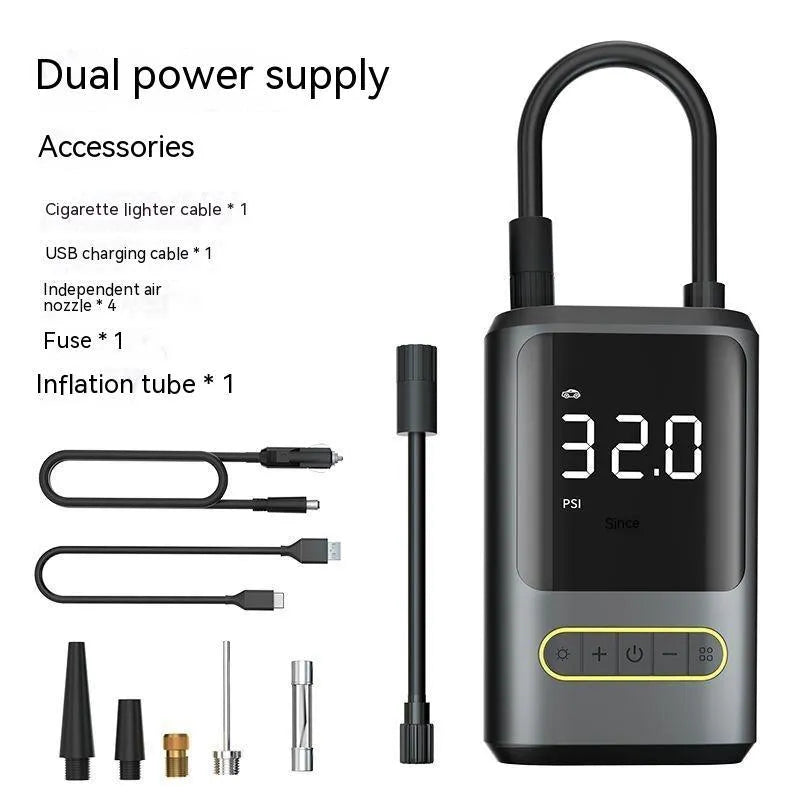 Black handheld digital wireless air pump with LED display and connected air hose on a grey background.