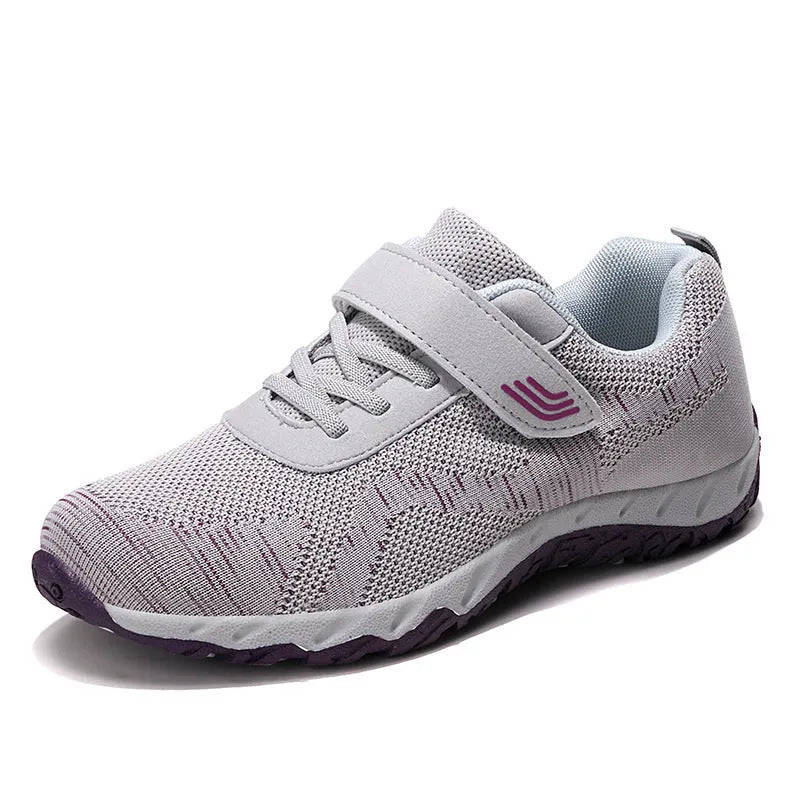 Women's low-top wedge heel shoes in grey purple with breathable mesh upper and Velcro strap.