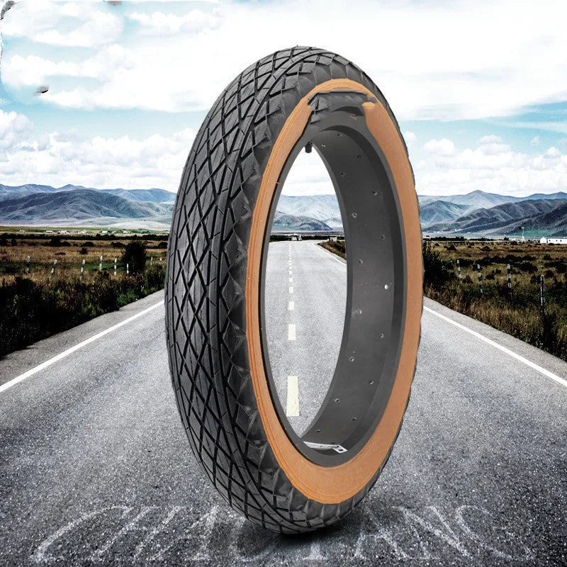 Brown rubber tyre with skin edge pattern for snowmobiles and electric beach carts, 20x4.0 inch dimensions