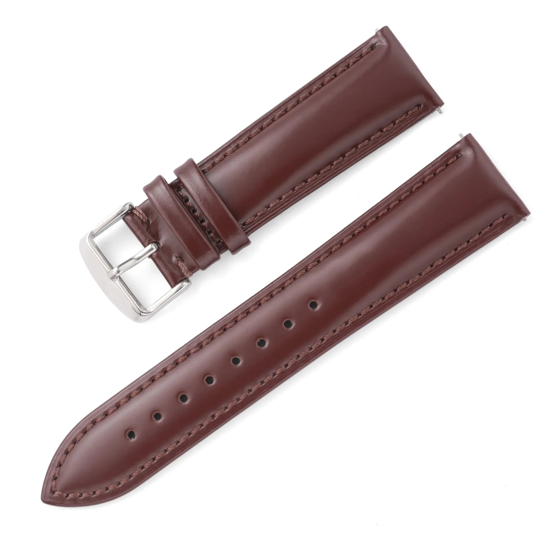 Quick release cowhide leather watch strap in black and white line colour on a watch.