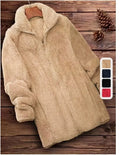 Double-sided velvet fleece jacket in black, shown on a hanger.