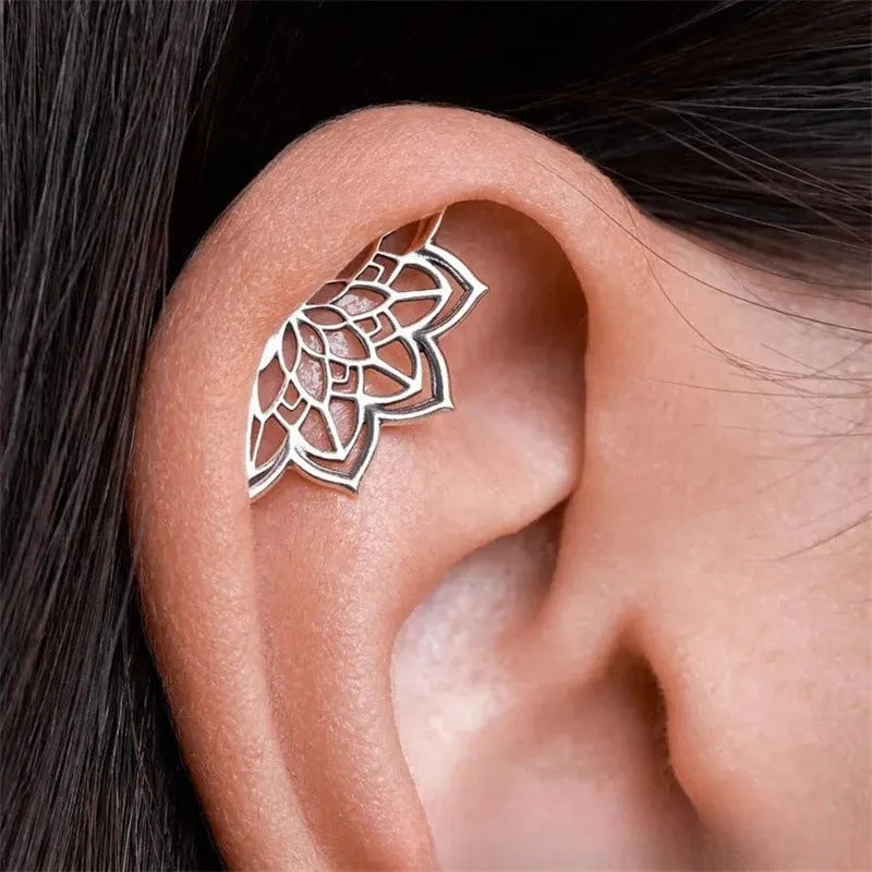 Spider web geometric mesh stud earrings in gold or silver electroplated metal for Halloween jewellery