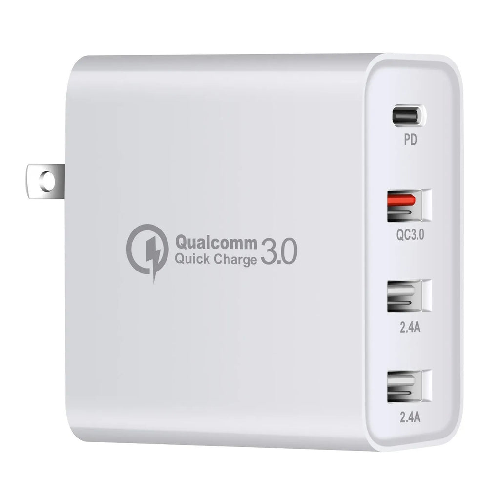 Black four-port USB-C wall charger with UK plug adapter and international travel plugs