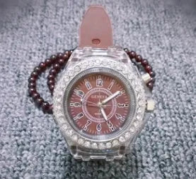 Women's LED luminous quartz watch with round 43mm alloy case and coloured silicone strap