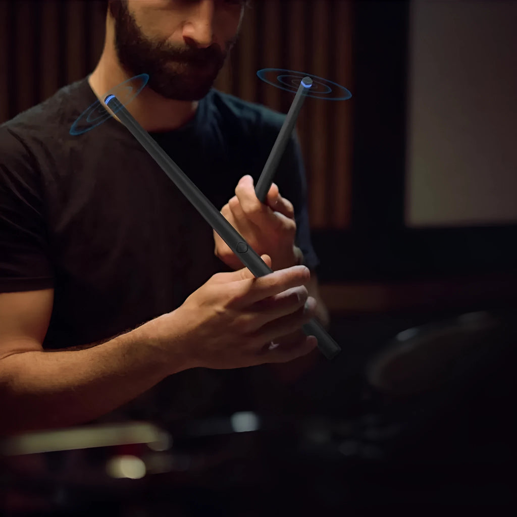 Black somatosensory air drum kit with wireless 2.4G connection, LED lighting, drumsticks, and charging cable