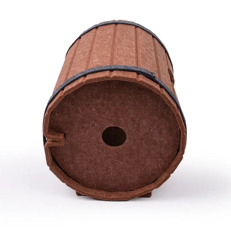 Assembled wine barrel shaped cat bed made from brown polyester fibre felt.