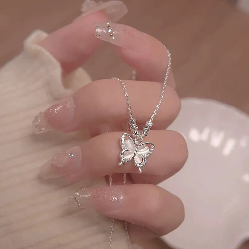 Women's silver butterfly necklace with animal pendant on adjustable 41-50cm cross chain