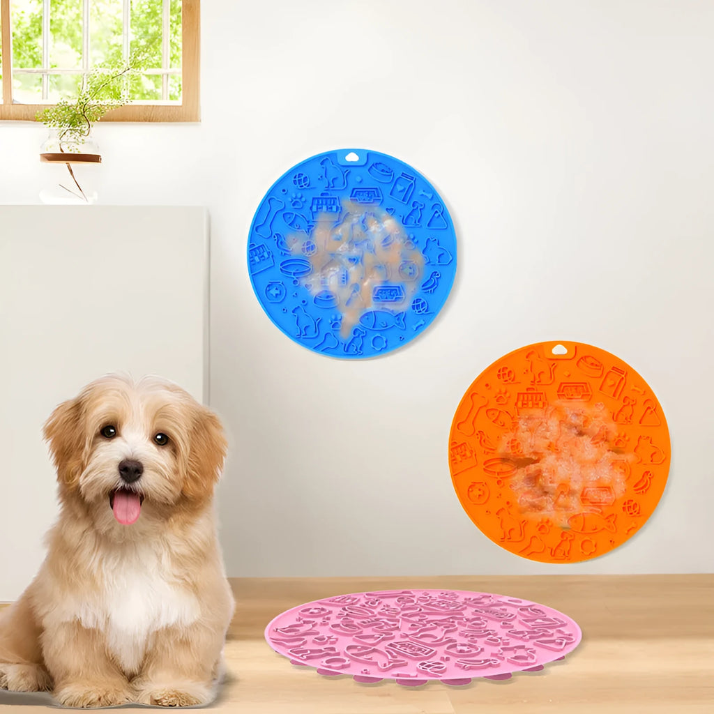 Round silicone pet licking mat with suction cup in blue, pink, grey, mint, or orange colour.