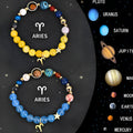 Two natural stone beaded bracelets with zodiac charms on an adjustable cord.