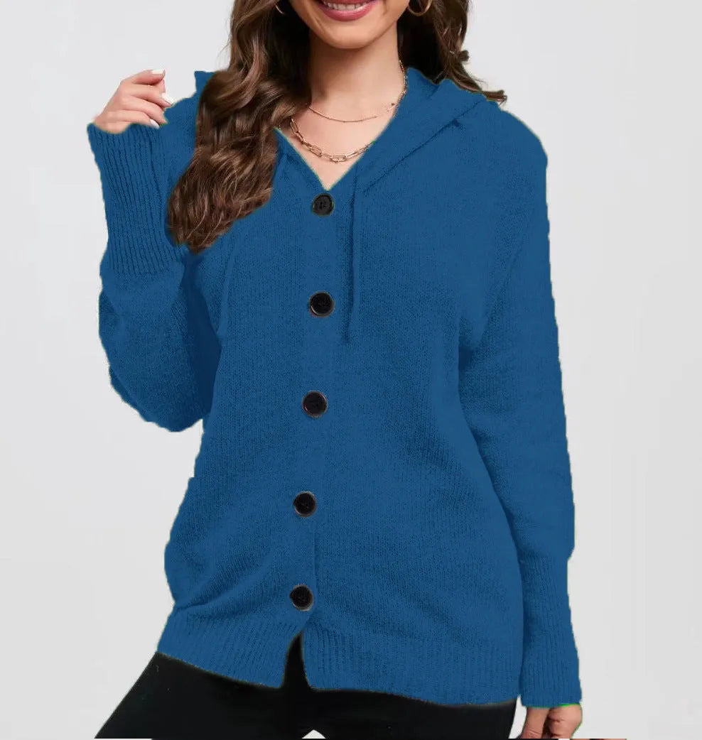 Women's solid colour loose-fit hooded cotton cardigan sweater on a hanger.