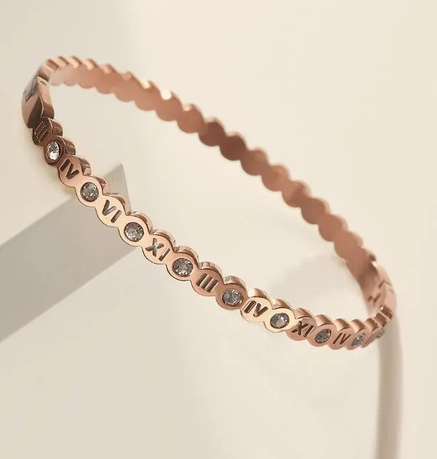Korean style titanium steel bracelet with number elements in gold rose gold or steel colour