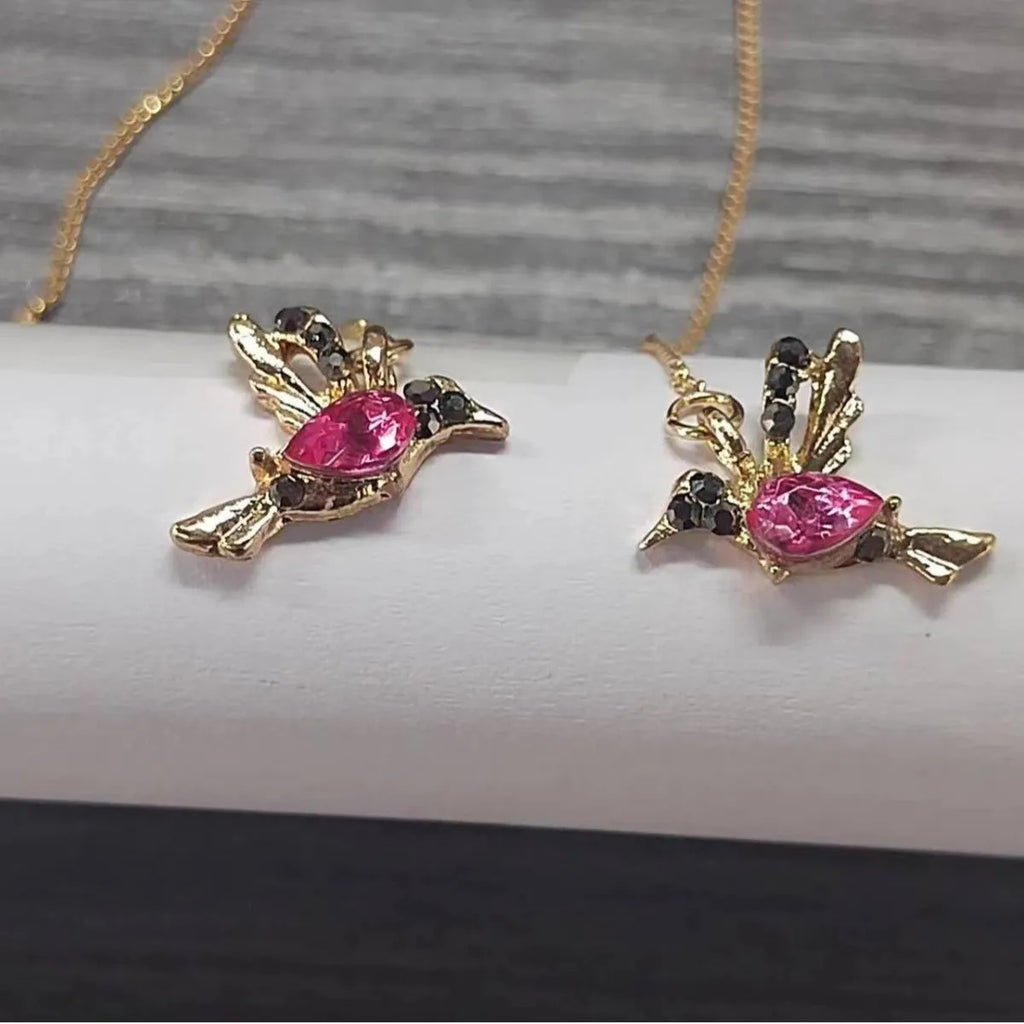 Long drop bird shaped alloy earrings for women with zirconium wings, shown in blue, red, and red lvzuan colour variations.