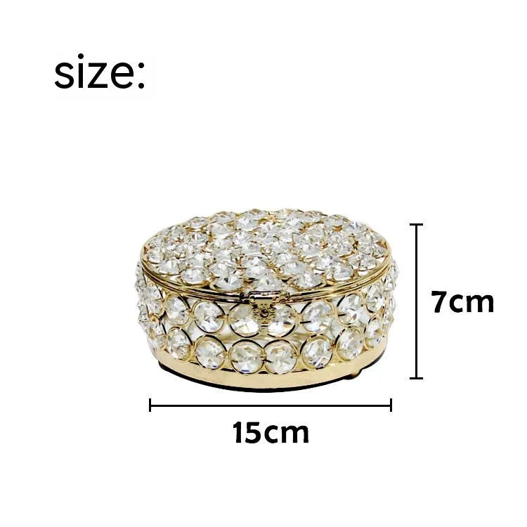 French gold European style jewellery storage box with transparent crystal glass sides and lid.
