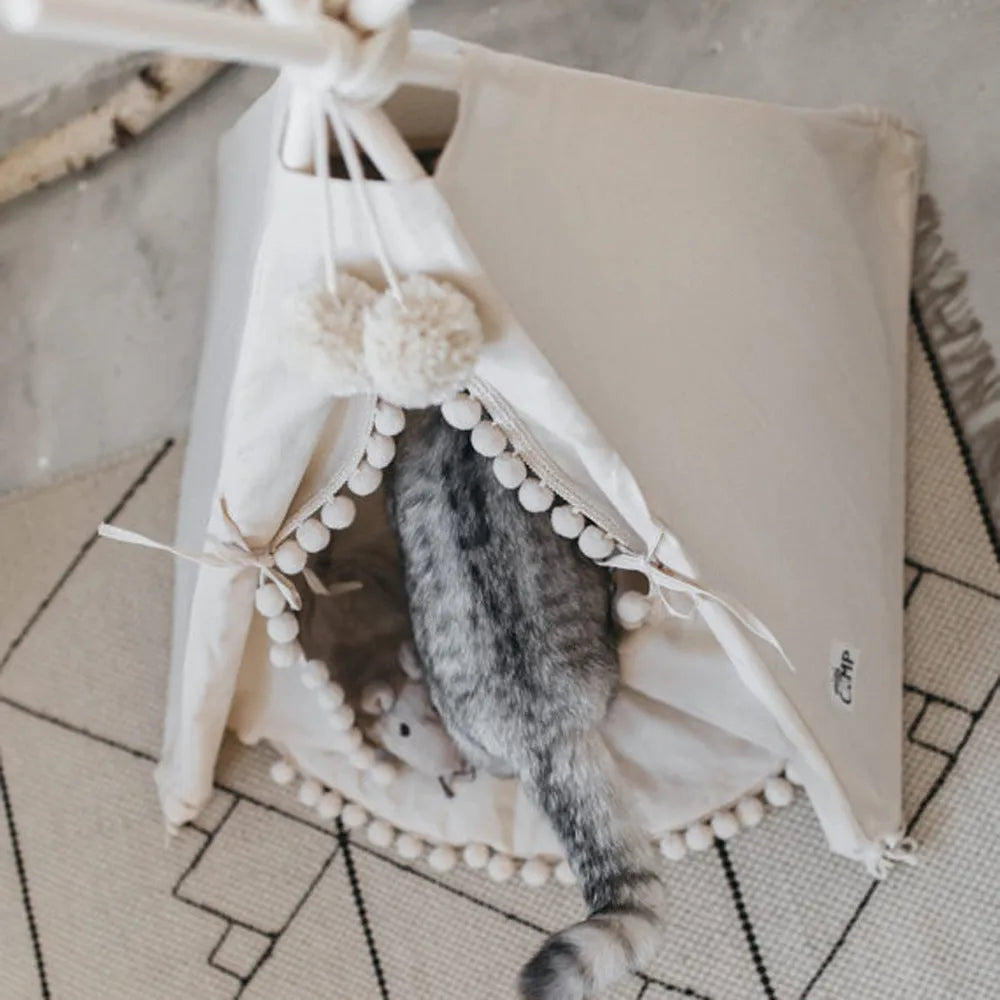 Canvas pet tent bed in teepee style with pine wood frame and removable cushion, suitable for cats and small dogs, size L shown.