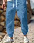 Men's straight-fit cotton trousers with elastic waist in army green colour