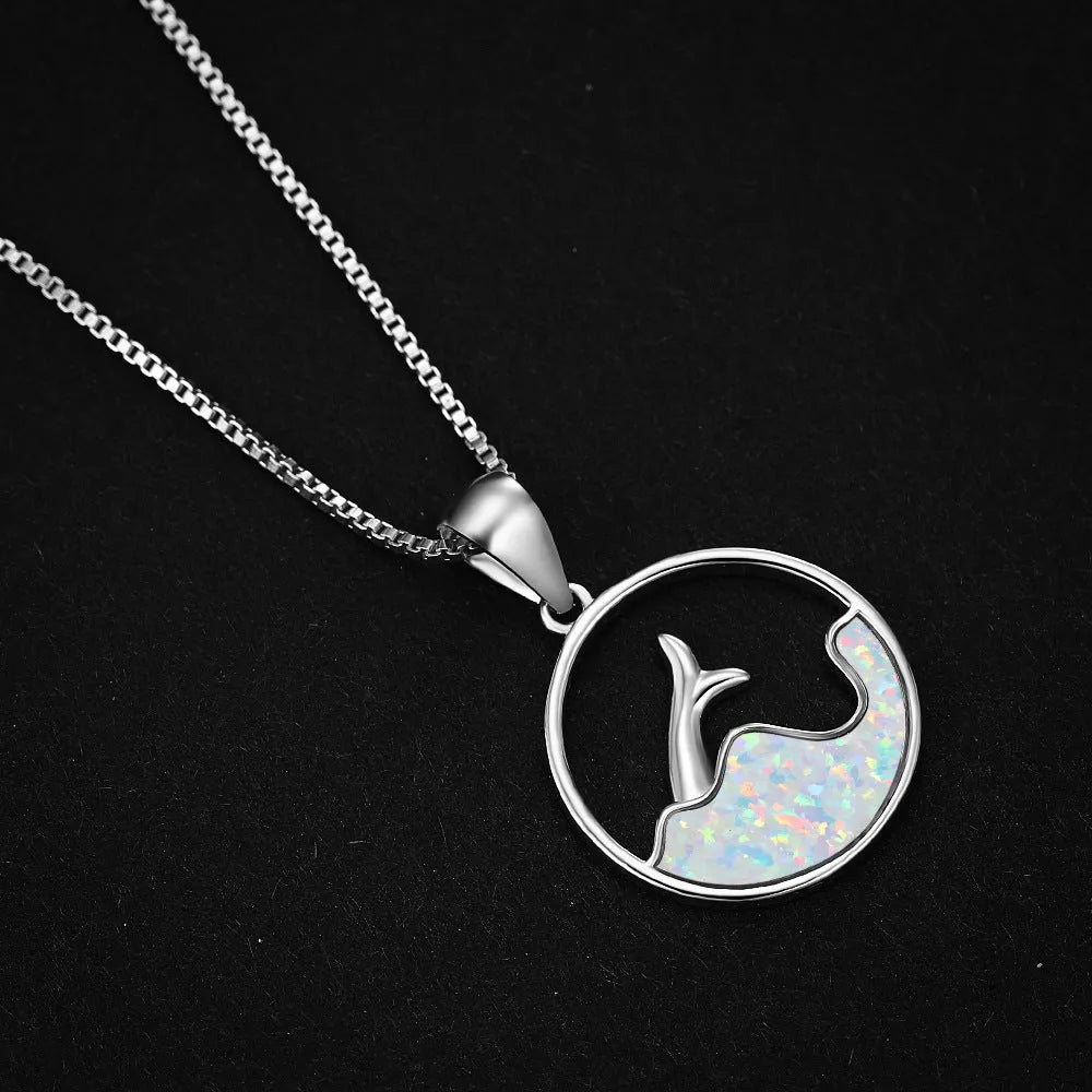 Geometric fishtail necklace with electroplated platinum opal finish on a copper base.