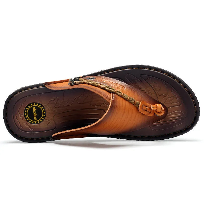 Men's dark blue herringbone pattern outdoor slippers with rubber sole and leather lining.