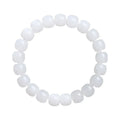 White Hetian jade barrel bead bracelet on a wrist, showing traditional unisex design.