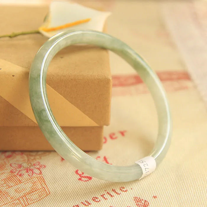 Green geometric jade waxy bracelet with manual craftsmanship and Chinese style design