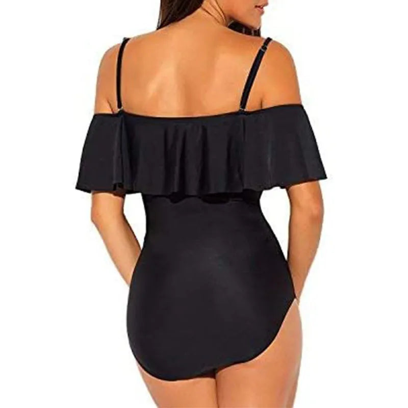 Black one-piece swimsuit with ruffled tube top straps and side cut-out details