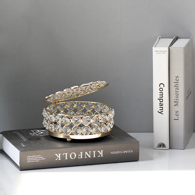French gold European style jewellery storage box with transparent crystal glass sides and lid.