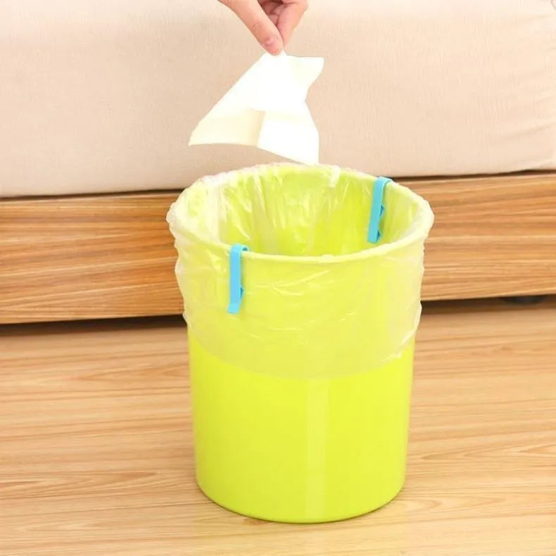 PP plastic non-slip clip for fixing a bin bag to the side of a rubbish can.