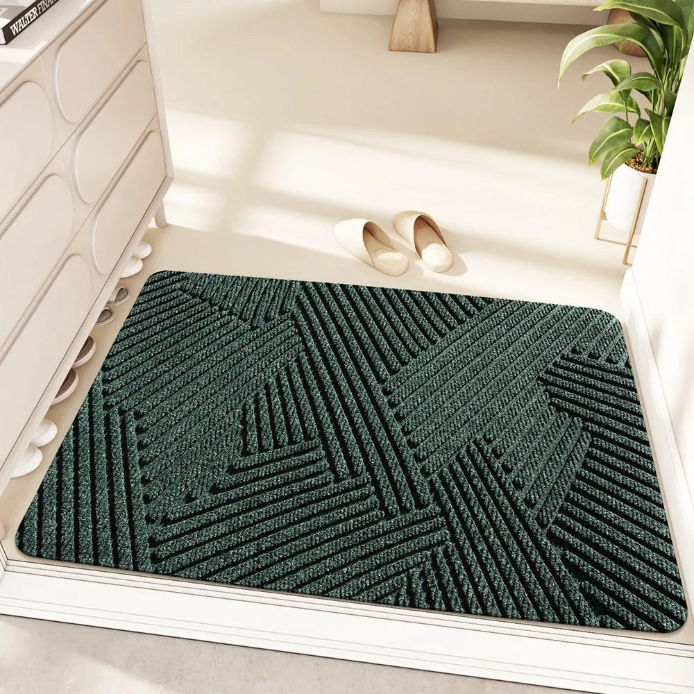 Green cartoon alien pattern diatom oil floor mat measuring 60 by 90 centimetres with a wire ring shape.