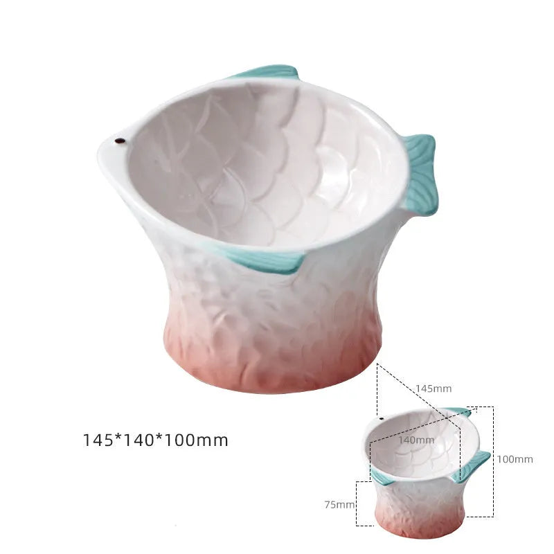 Blue fish-shaped ceramic cat bowl with 15-degree tilt angle and elevated design