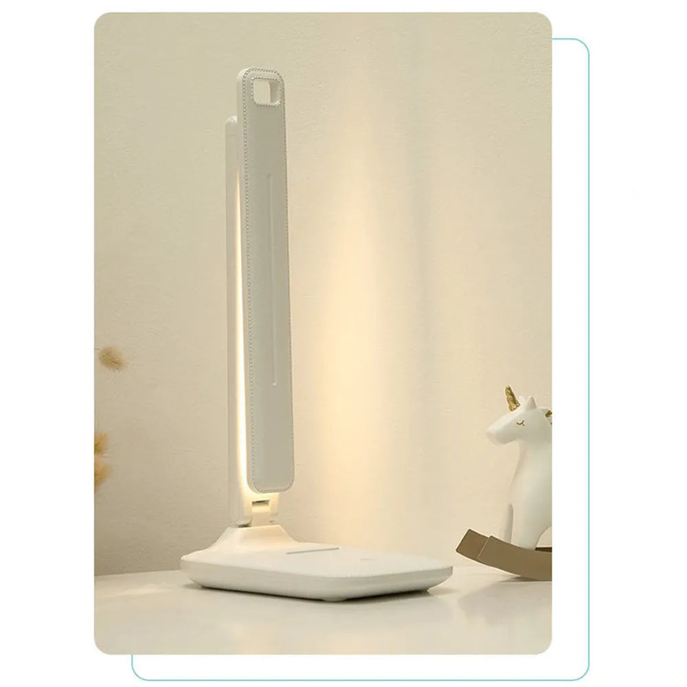 White touch-control bedside lamp with dimming settings for a child's bedroom