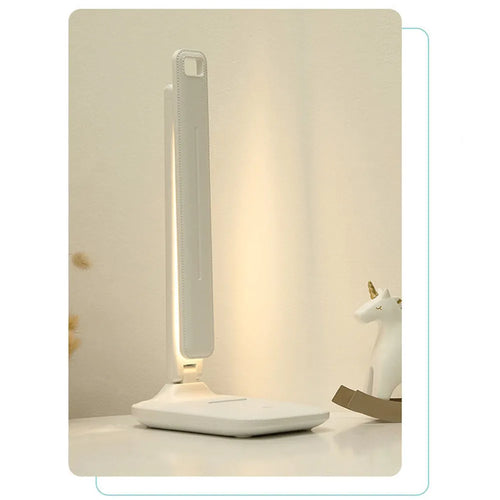 White touch-control bedside lamp with dimming settings for a child's bedroom