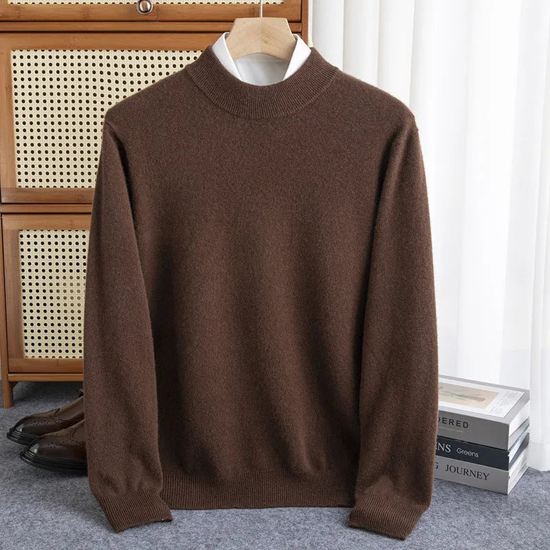 Man wearing a loose-fit half-collar wool sweater in a dark colour, showcasing the knitted texture and neckline design.