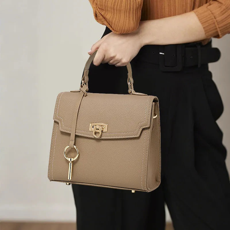 Elephant grey genuine leather vintage handbag with lock closure and square vertical design