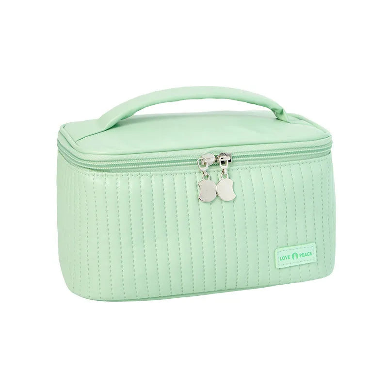 Open-top makeup bag in PU leather showing six colour options including pink, coffee, and light blue