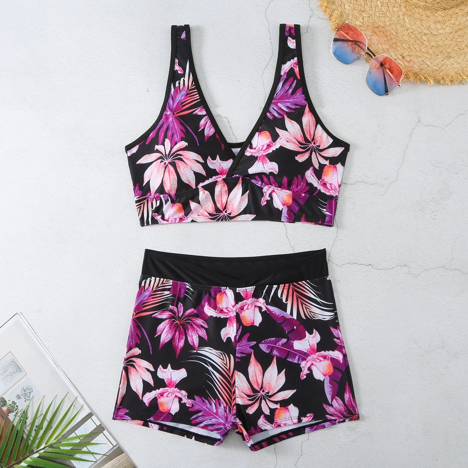 Women's two-piece swimsuit set with sleeveless top and printed boxer-style briefs in multiple colours.