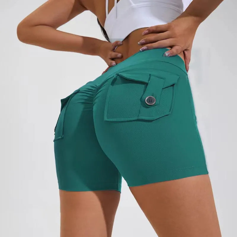 Women's high waist hip lifting sports shorts with side pockets in electric blue colour