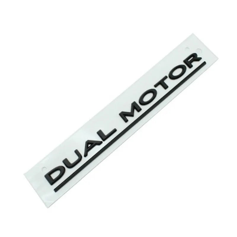 Tesla Model 3 Performance rear bumper sticker in ABS plastic, 19cm by 3cm, shown in matte black and stripe variants.