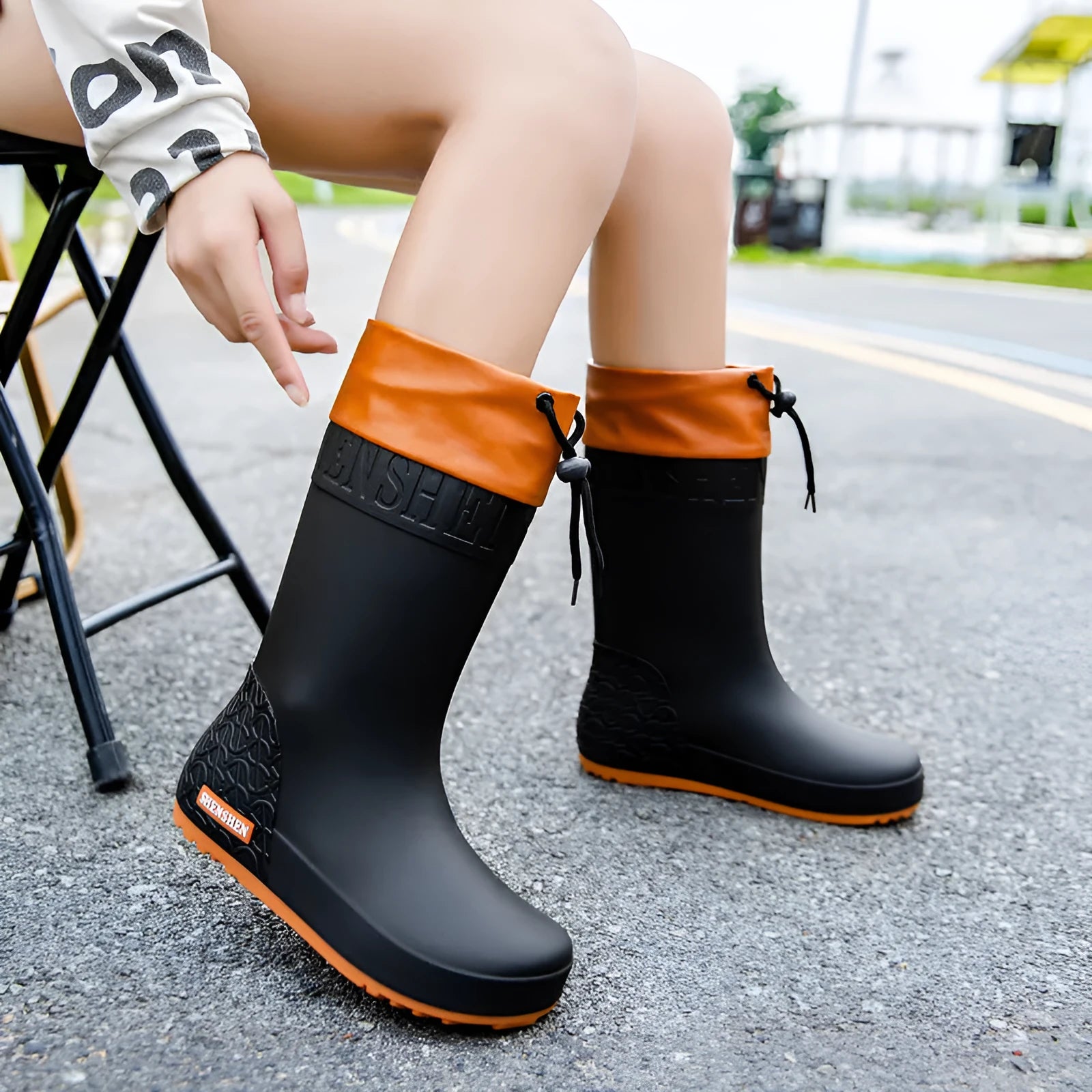 Women's PVC rain boots in solid colours with non-slip soles and waterproof mouth design