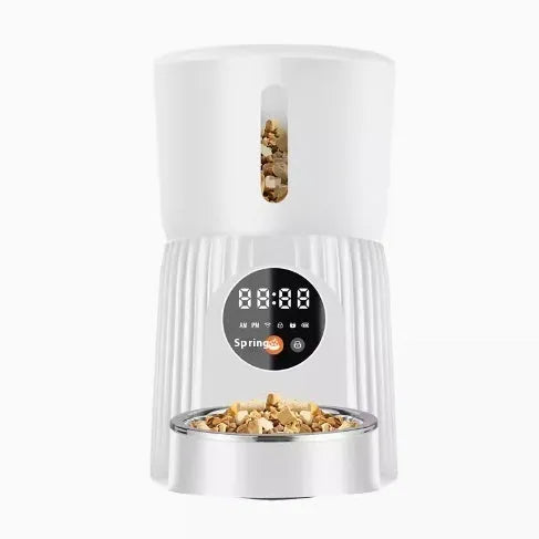 Black intelligent pet feeder with USB cable connection and food dispenser opening