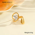 Women's geometric zircon ring with adjustable open mouth design on a hand.